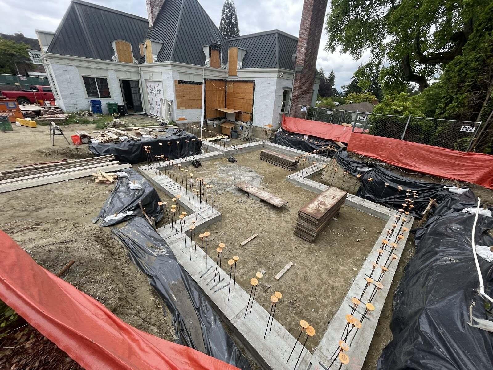Overhead view of foundation forms and excavated pad