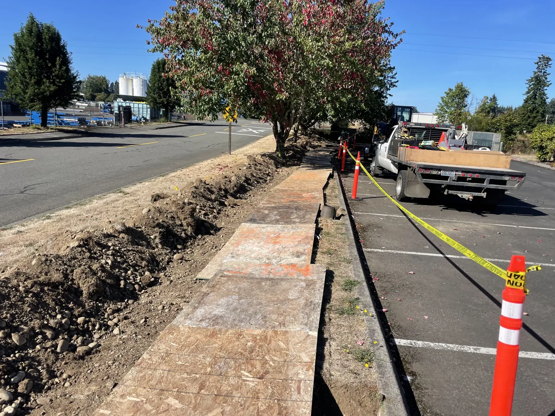 Trenching for curb and sidewalk along a roadway