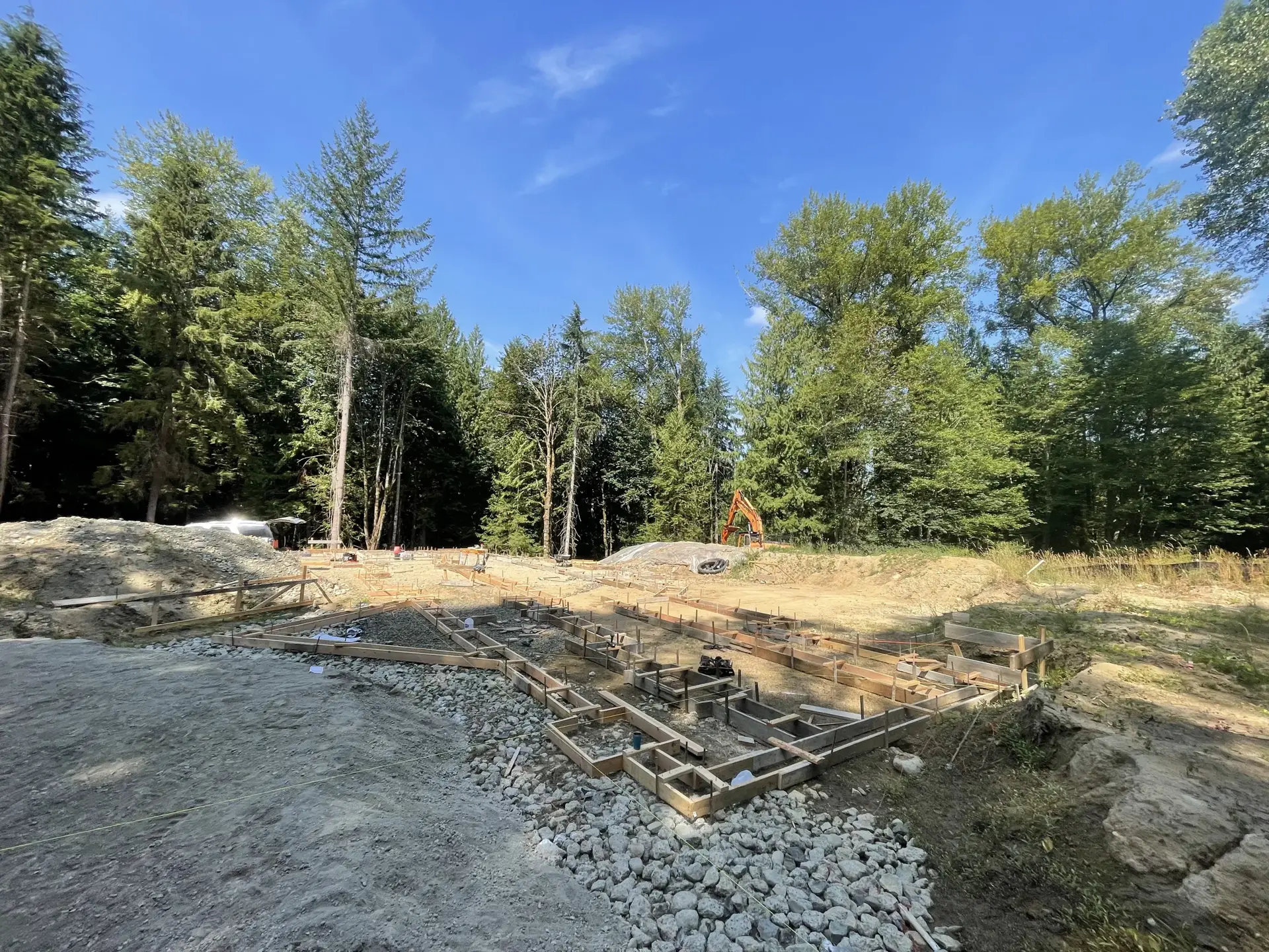 Land clearing and excavation in a wooded lot