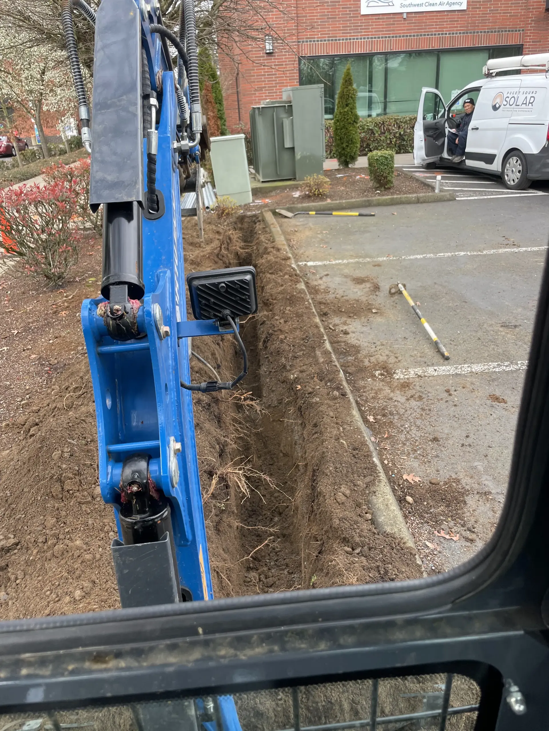 Operator view looking down into a freshly dug trench