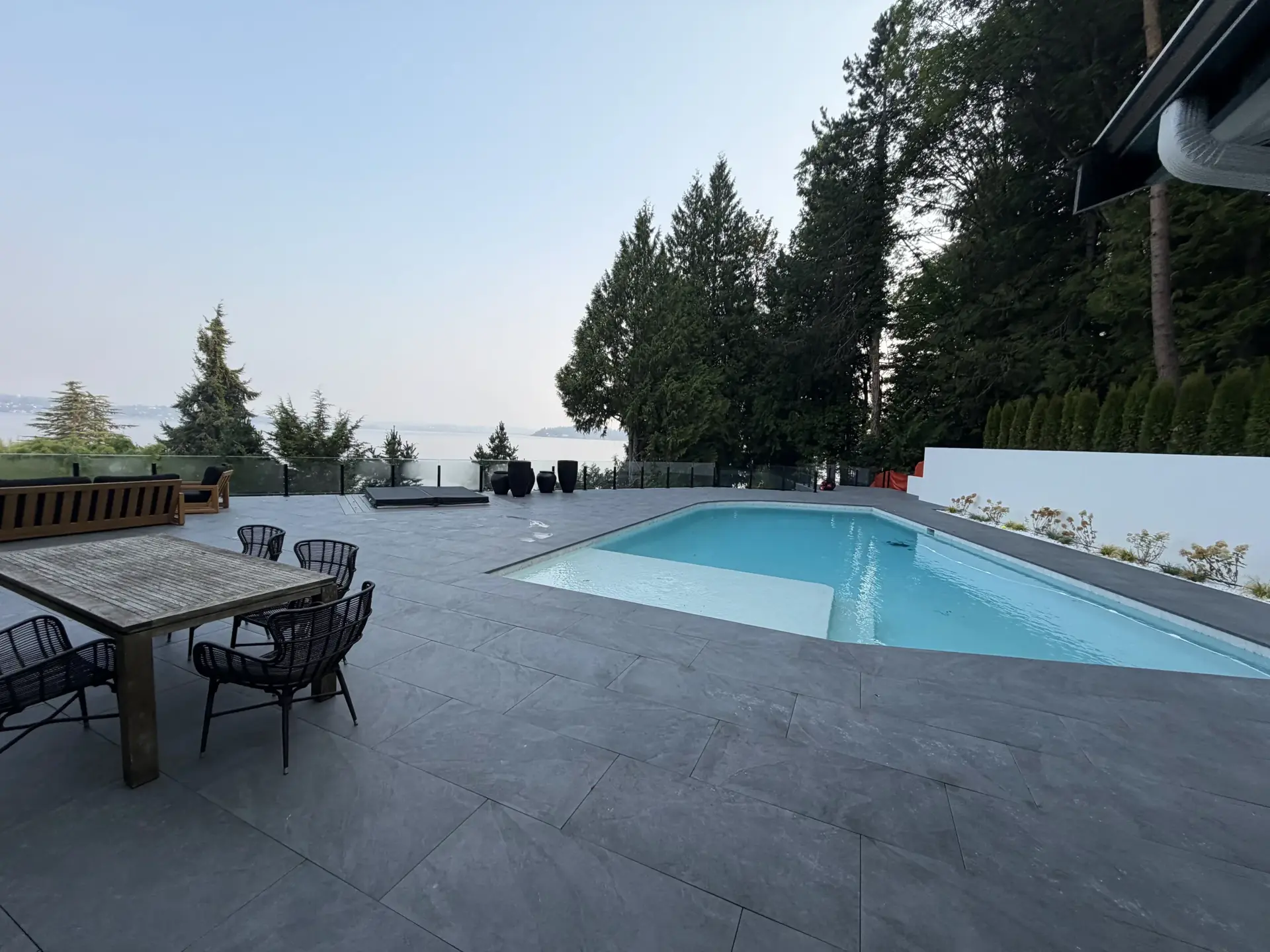 Large concrete pool deck patio