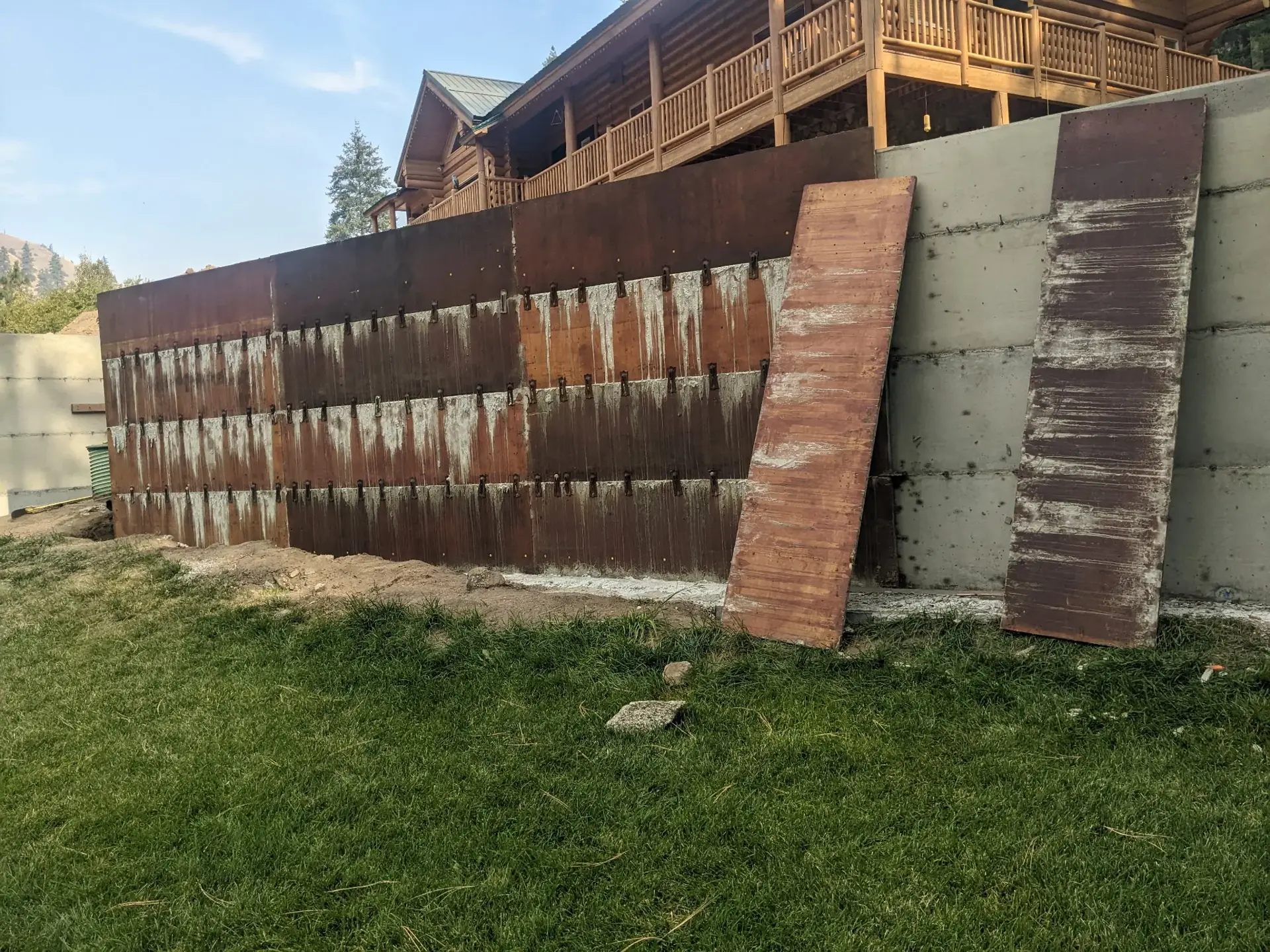 Retaining wall metal forms on site
