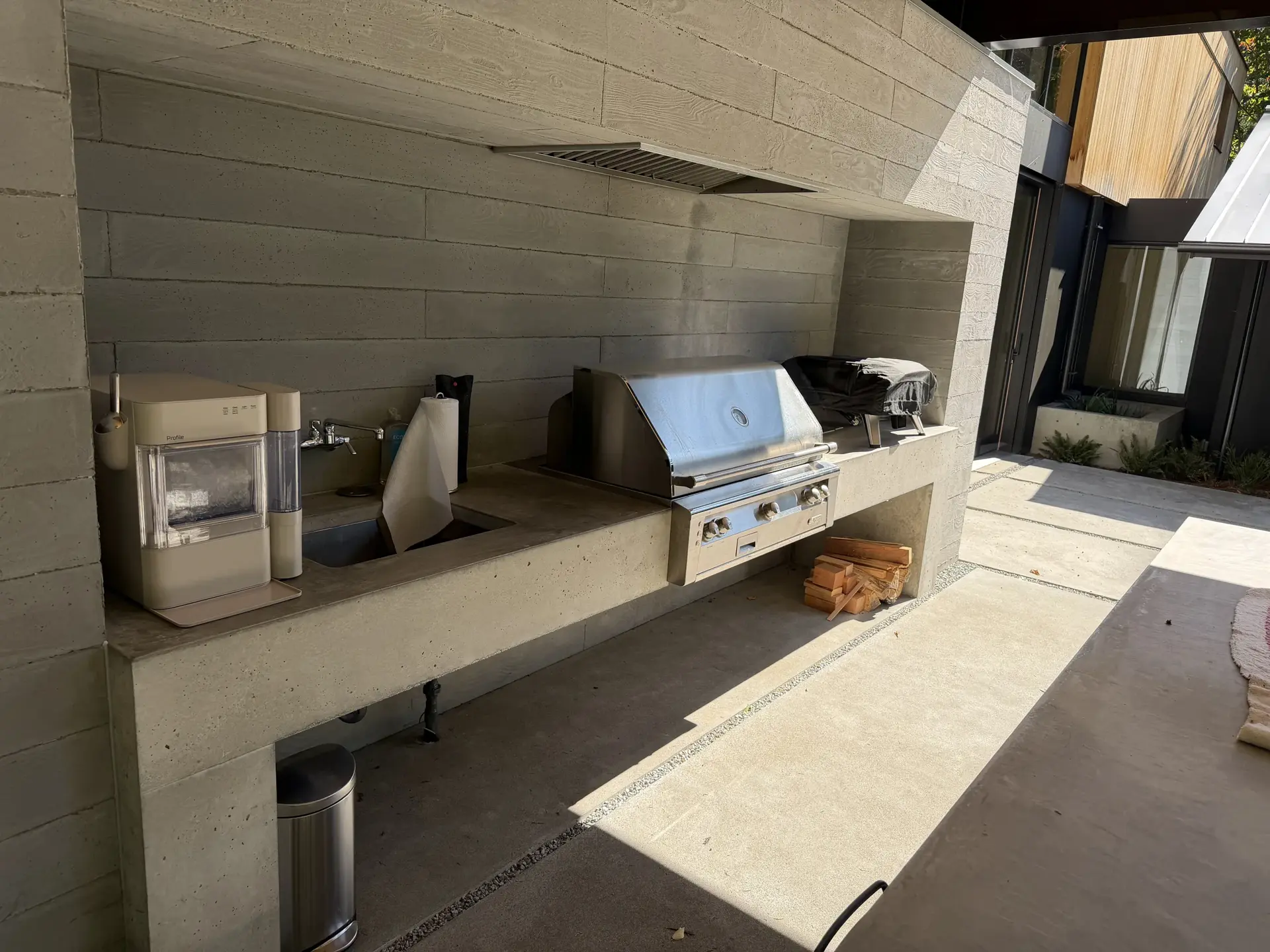 Finished board-formed concrete outdoor kitchen counter