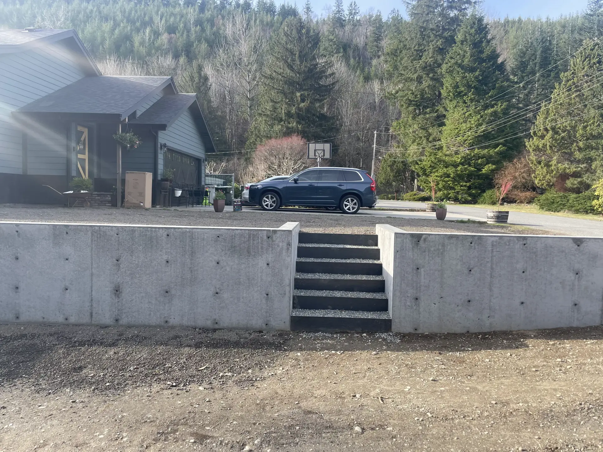 Long retaining wall with centered stairs